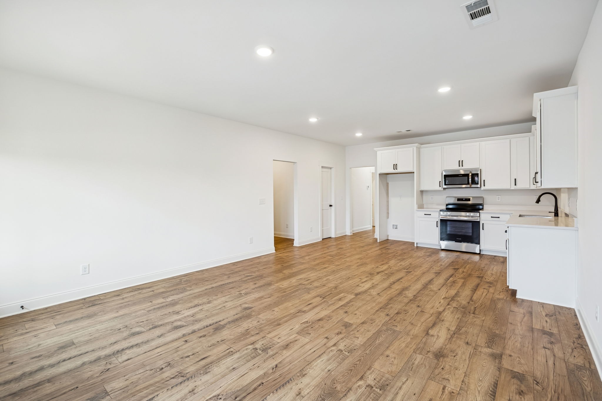 609 South Main Street Mount Pleasant, TN 38474 - Photo 9 of 37 a view of kitchen with wooden floor