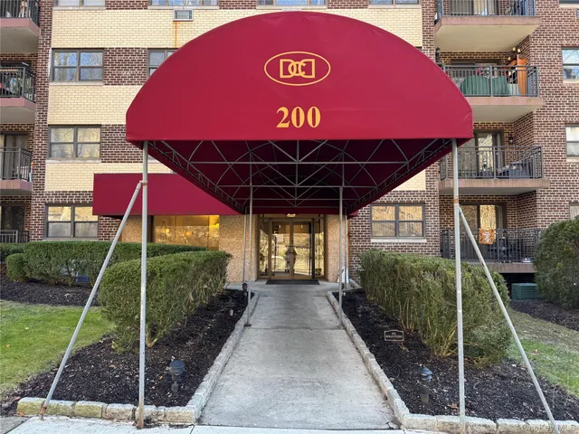 a front view of a house with yard