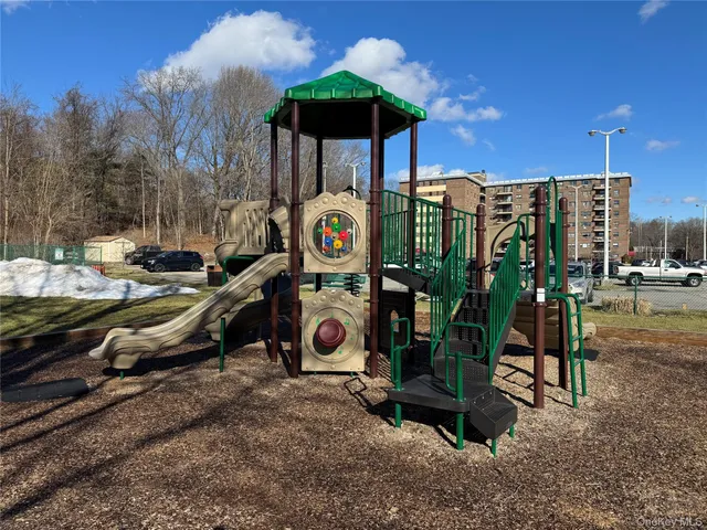 a view of a chairs and tables in the patio