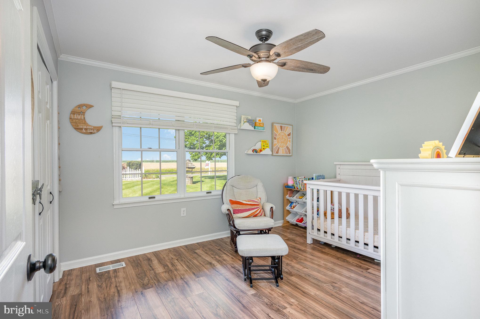 705 Knights Corner Road Elkton, MD 21921 - Photo 21 of 35 a living room with furniture and a window