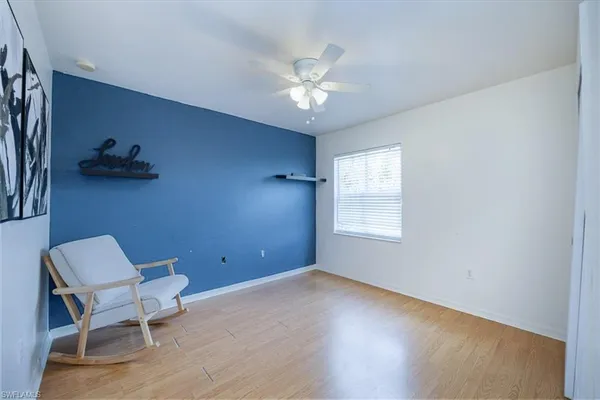 a view of a livingroom with a workspace