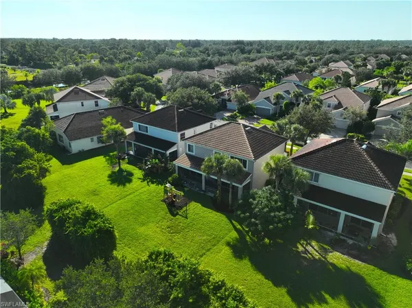 an aerial view of a house with a garden