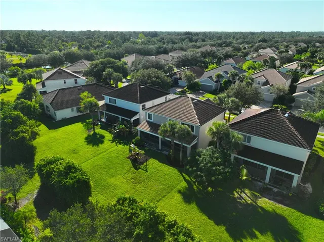 an aerial view of a house with a garden