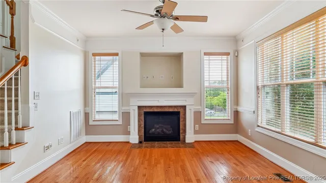 a kitchen with stainless steel appliances wooden cabinets and a stove top oven