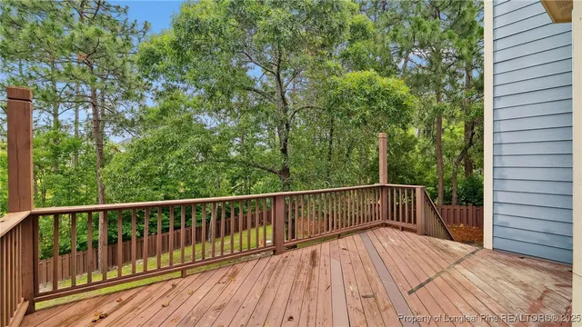a view of backyard with deck