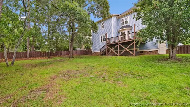 a view of a backyard with a trees
