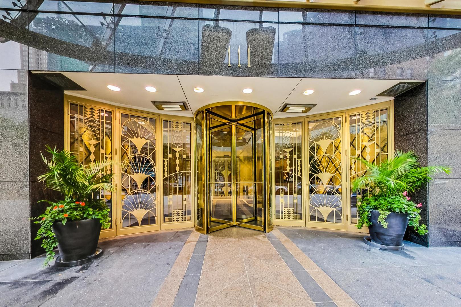 111 East Chestnut Street, Unit PHAB Chicago, IL 60611 - Photo 115 of 124 a view of front door and potted plants