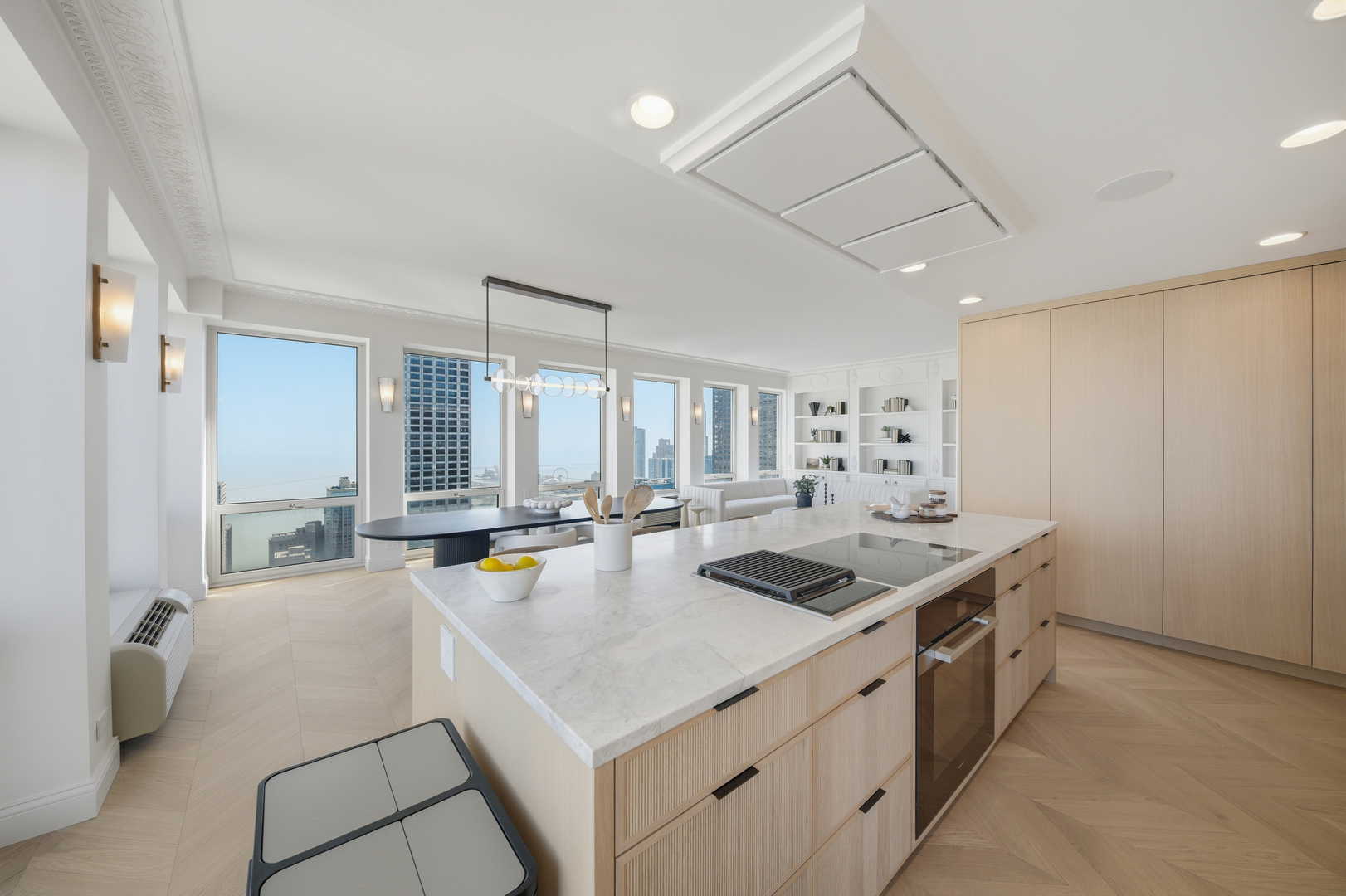 111 East Chestnut Street, Unit PHAB Chicago, IL 60611 - Photo 12 of 124 a kitchen that has a sink and a stove with white cabinets