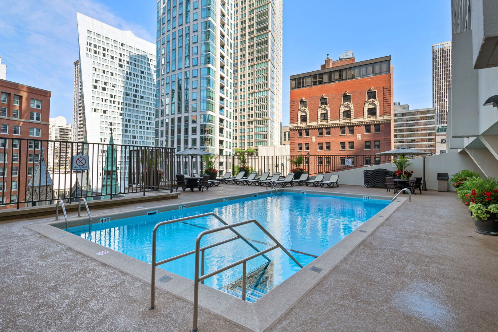 111 East Chestnut Street, Unit PHAB Chicago, IL 60611 - Photo 121 of 124 a swimming pool with outdoor seating and yard