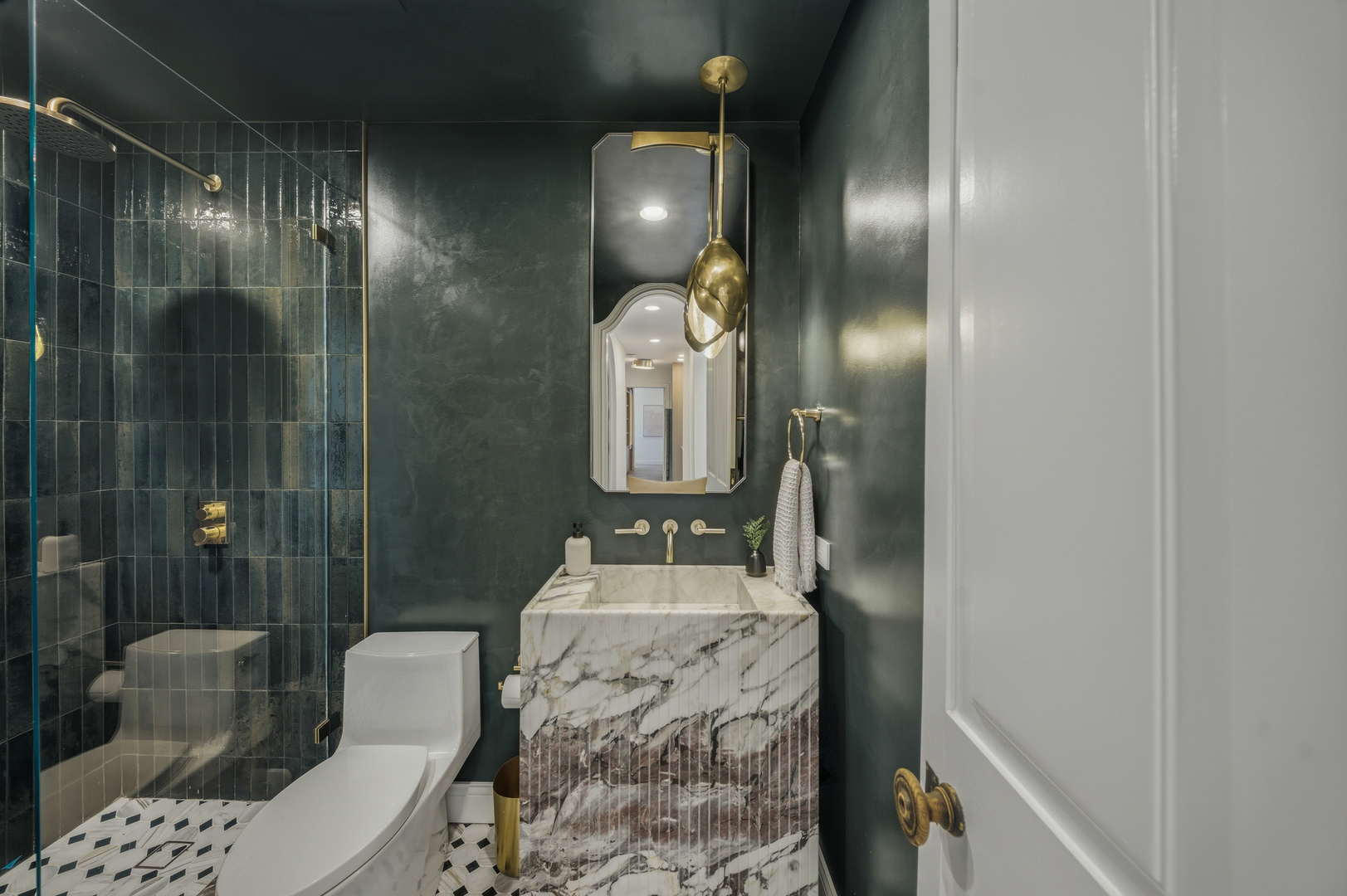 111 East Chestnut Street, Unit PHAB Chicago, IL 60611 - Photo 63 of 124 a bathroom with a sink a toilet and shower
