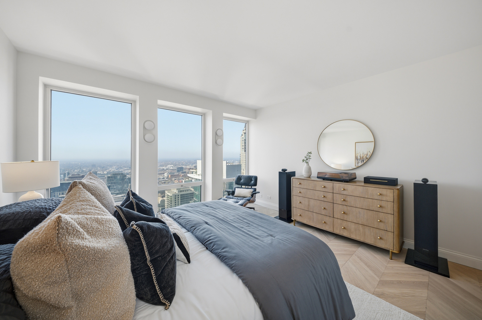 111 East Chestnut Street, Unit PHAB Chicago, IL 60611 - Photo 69 of 124 a bed room with a bed and a dresser