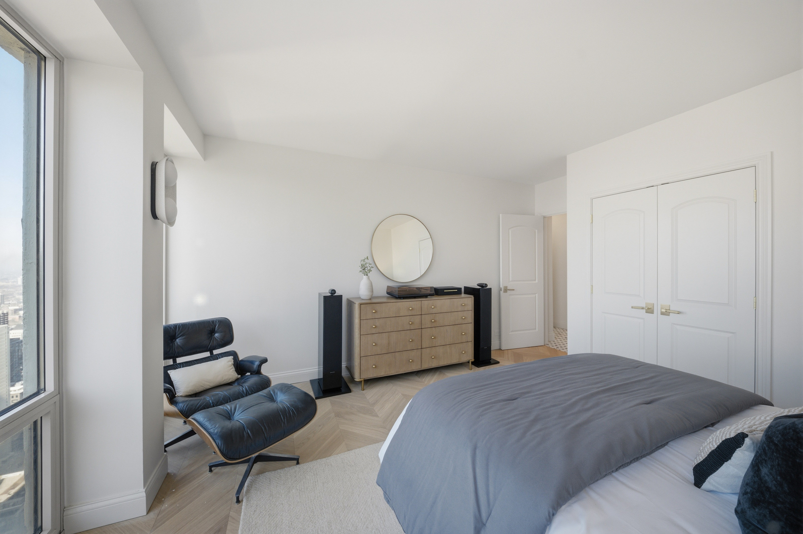 111 East Chestnut Street, Unit PHAB Chicago, IL 60611 - Photo 74 of 124 a bedroom with a bed and a chair