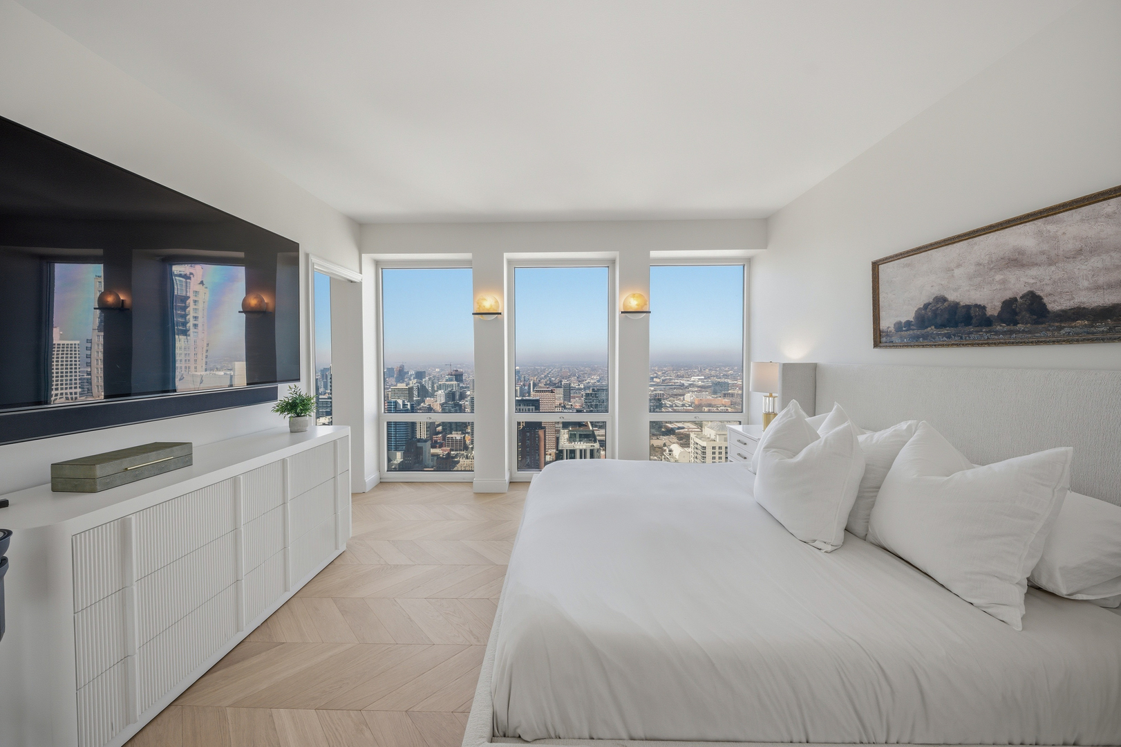 111 East Chestnut Street, Unit PHAB Chicago, IL 60611 - Photo 88 of 124 a spacious bedroom with a large bed and a large window