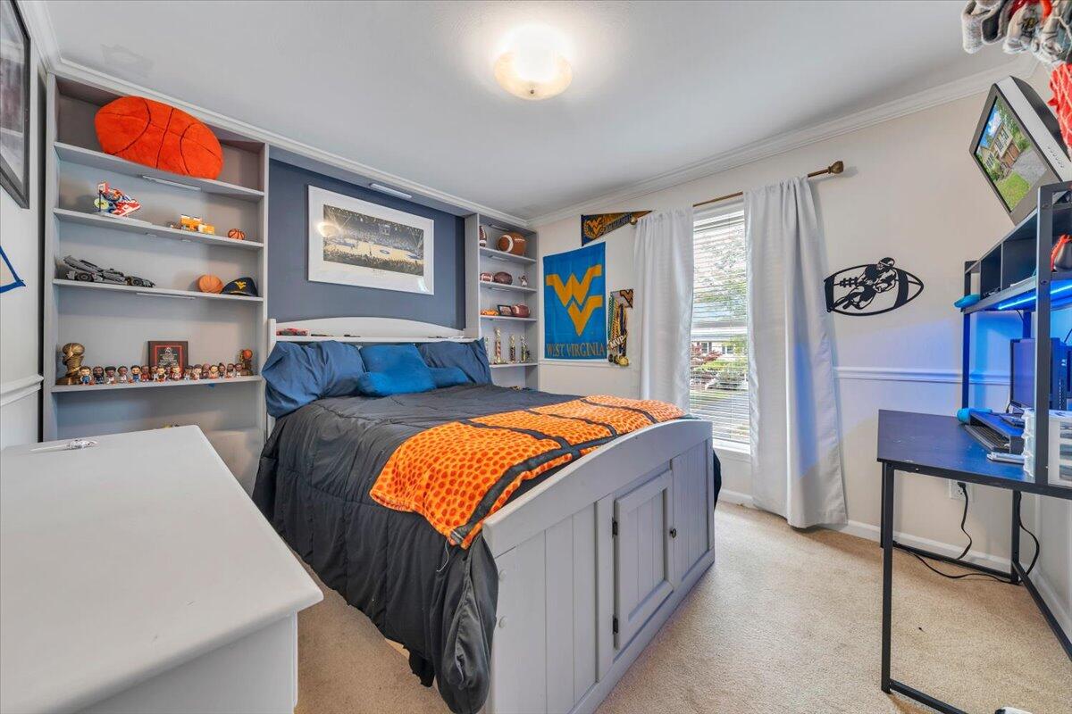 7851 Cedar Edge Road Roanoke, VA 24018 - Photo 19 of 44 a bedroom with bed and a window
