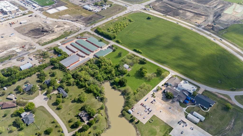 5799 North Custer Road Prosper, TX 75078 - Photo 2 of 21 an aerial view of a football ground