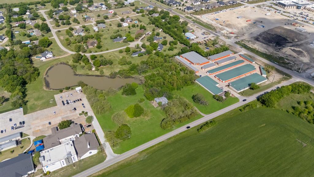 5799 North Custer Road Prosper, TX 75078 - Photo 5 of 21 an aerial view of a residential houses with outdoor space and street view