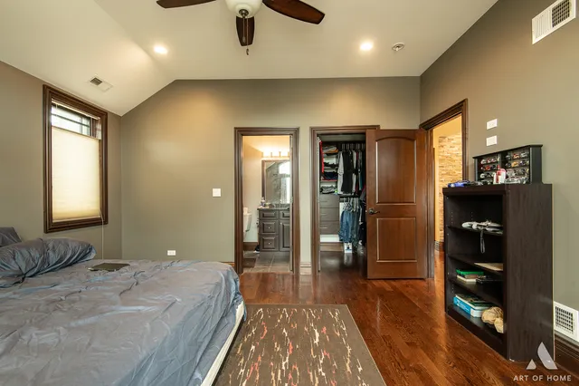 a spacious bathroom with a glass shower door and a bathtub