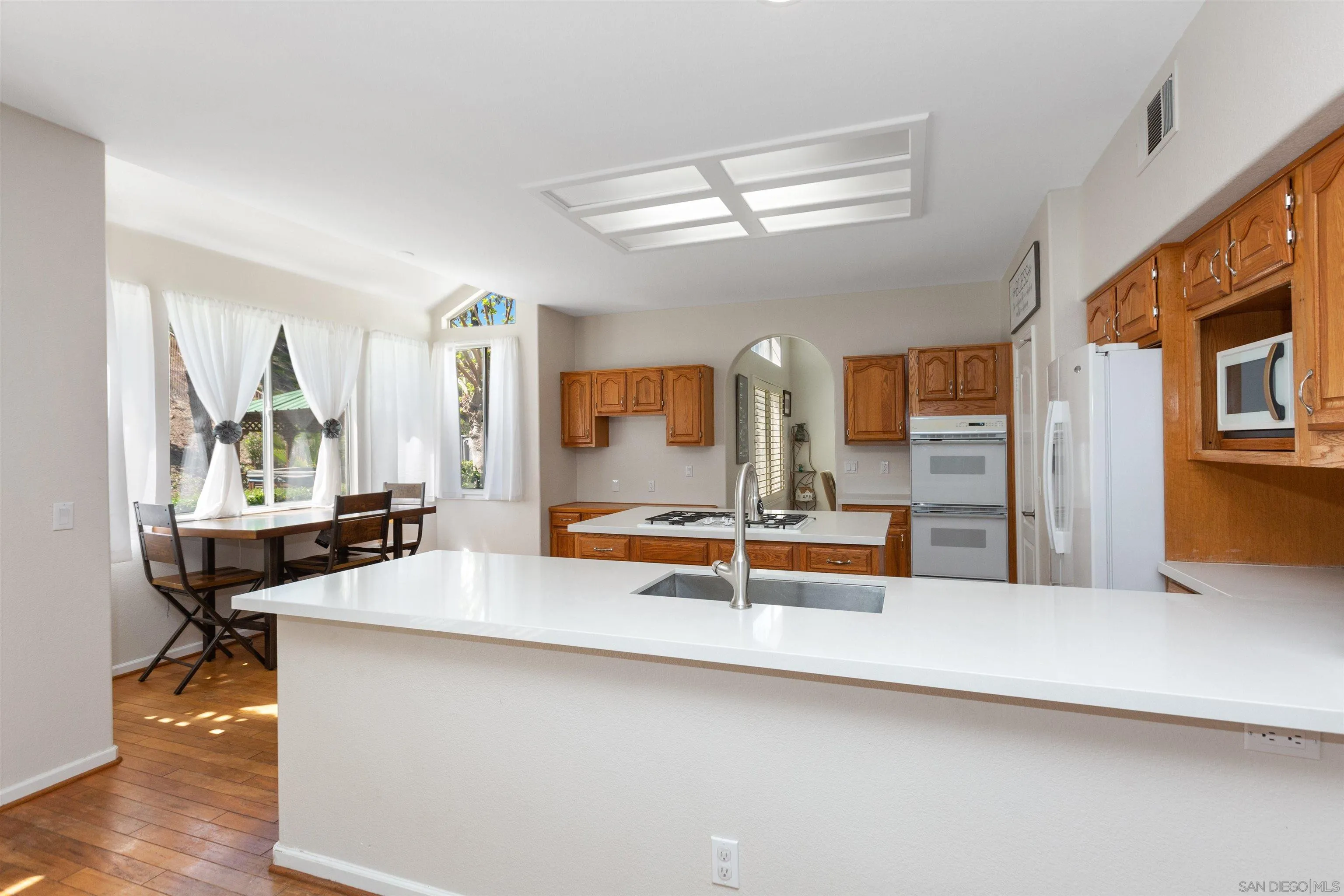31759 Corte Rosario Temecula, CA 92592 - Photo 14 of 44 a view of a living room and dining room