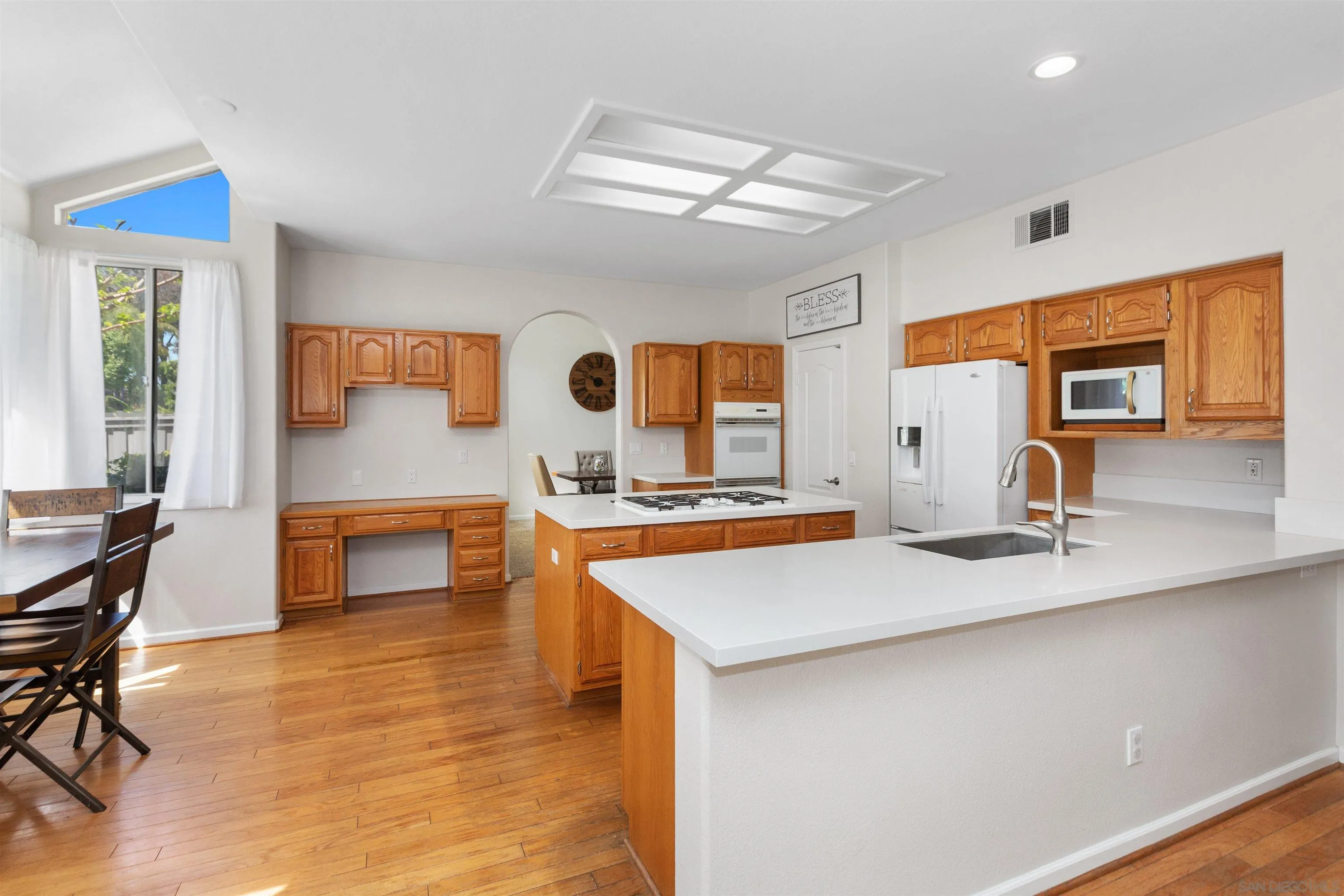 31759 Corte Rosario Temecula, CA 92592 - Photo 15 of 44 a kitchen with stainless steel appliances granite countertop a sink and a counter space