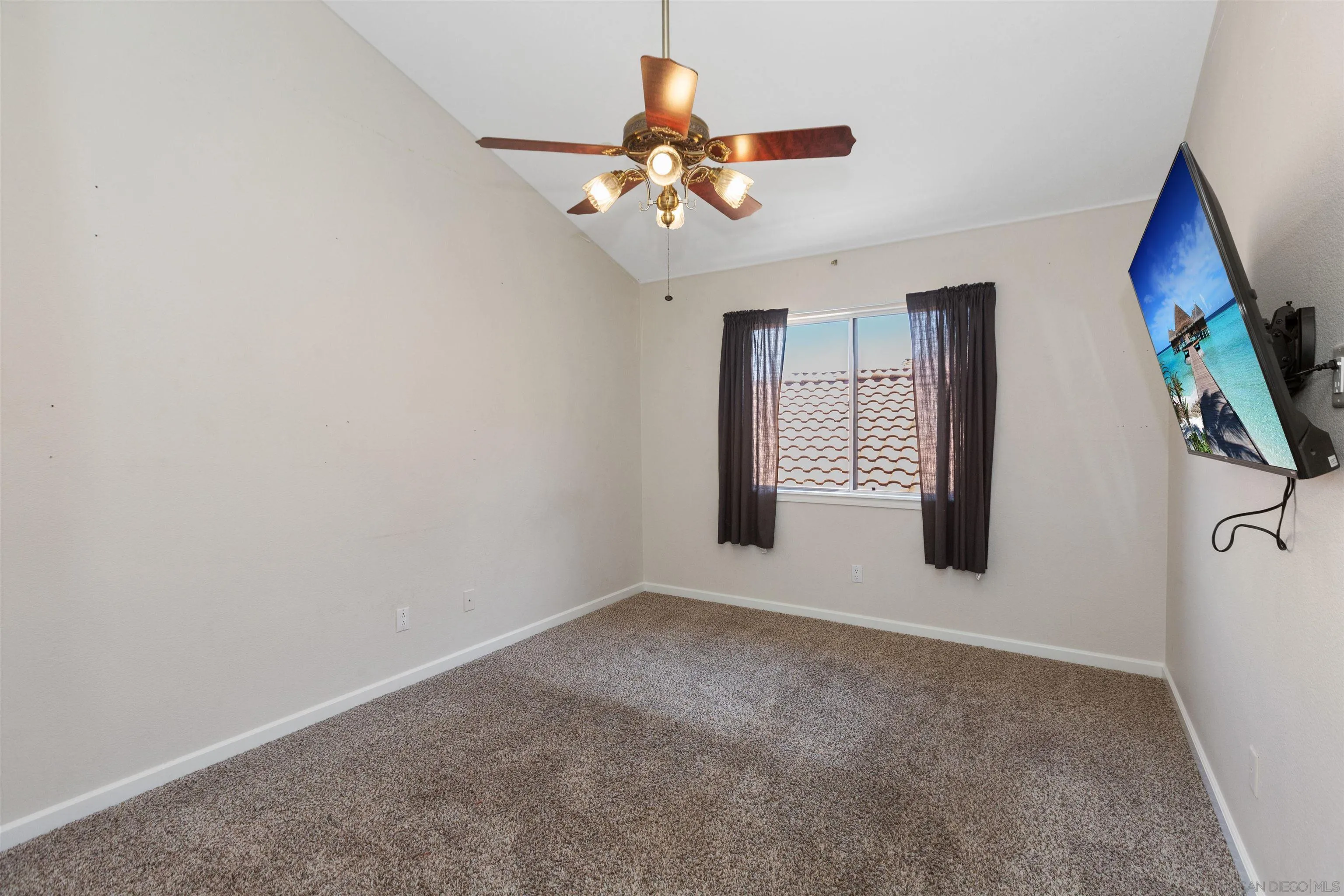 31759 Corte Rosario Temecula, CA 92592 - Photo 28 of 44 a view of an empty room with a window