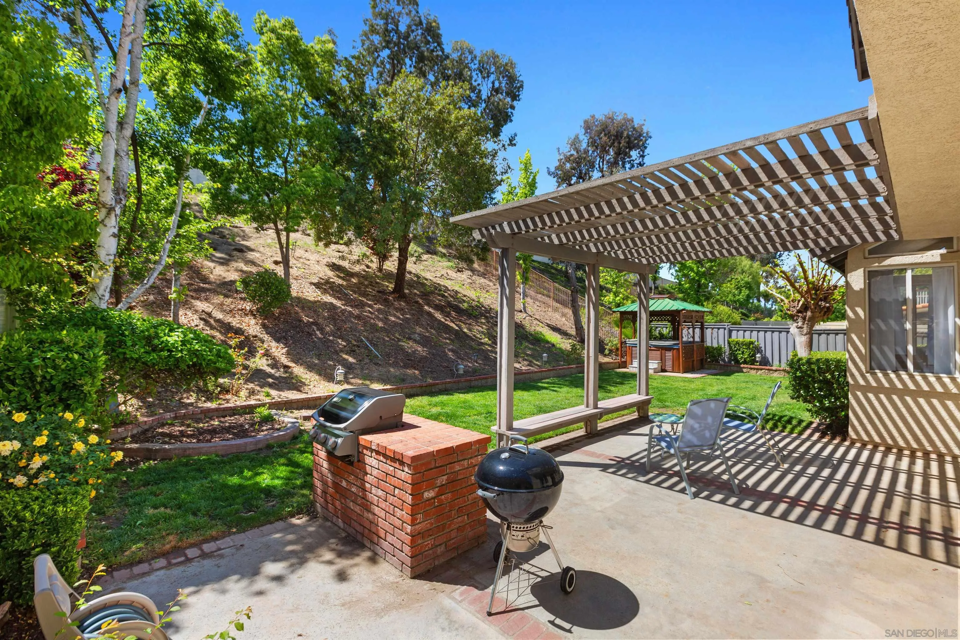31759 Corte Rosario Temecula, CA 92592 - Photo 31 of 44 a view of a backyard with sitting area