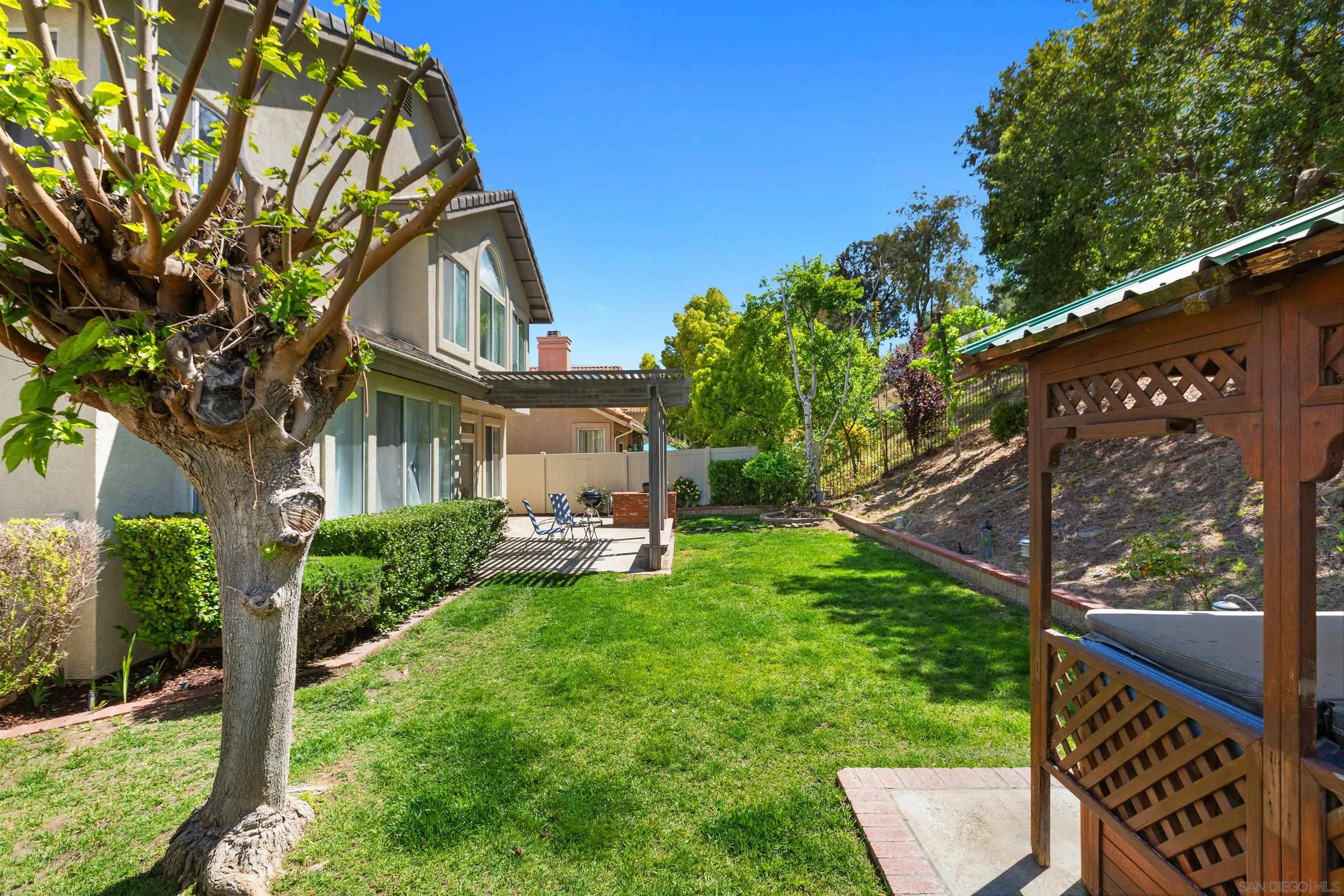 31759 Corte Rosario Temecula, CA 92592 - Photo 34 of 44 a view of a house with backyard porch and sitting area