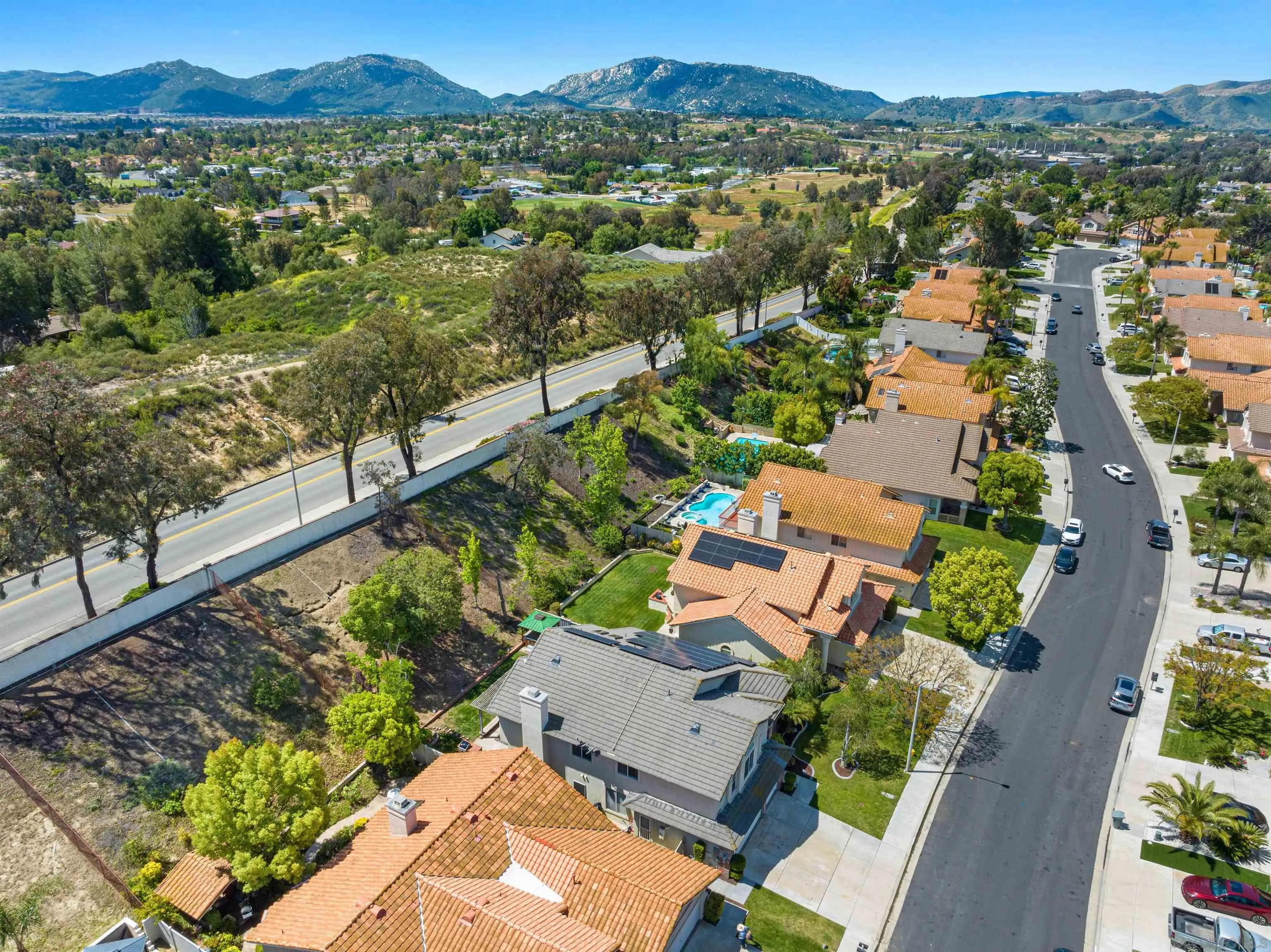 31759 Corte Rosario Temecula, CA 92592 - Photo 36 of 44 an aerial view of residential houses with outdoor space and street view