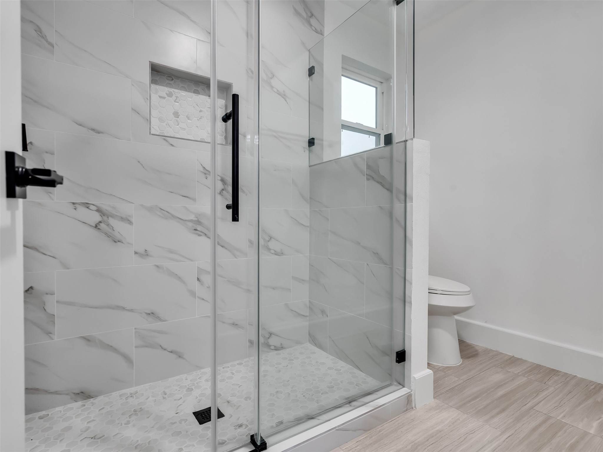 4023 Laverock Road Spring, TX 77388 - Photo 25 of 36 Elegantly tiled master shower with frameless glass sliding doors