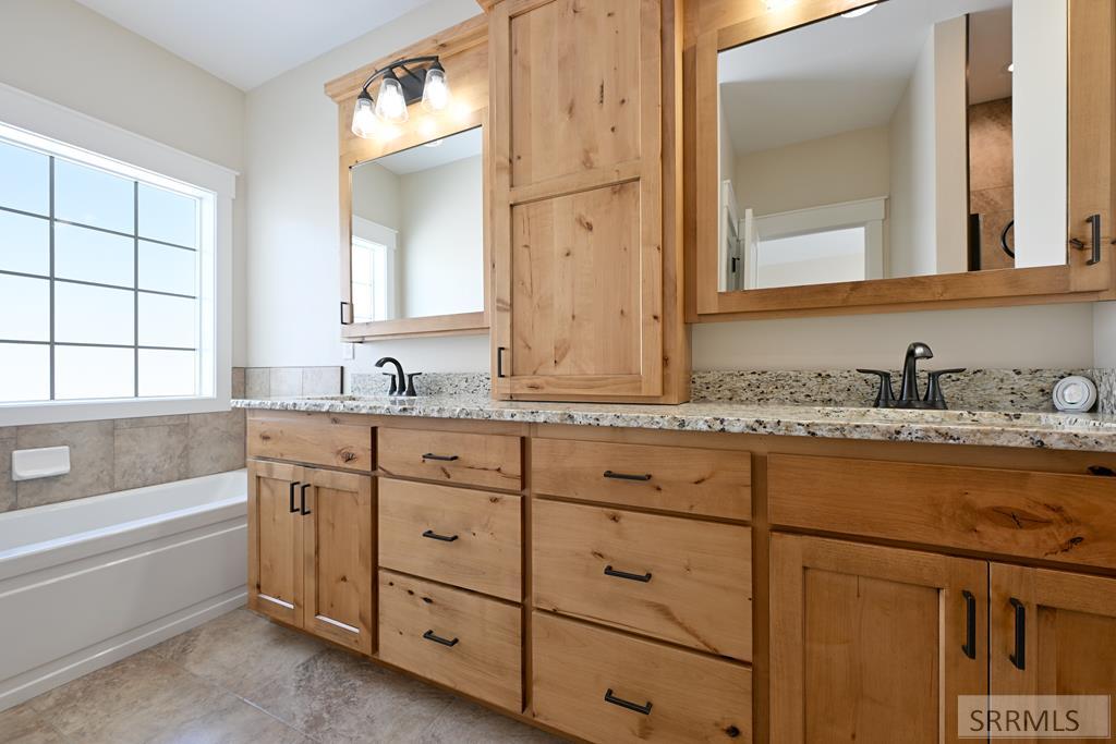 4922 Torcello Drive Ammon, ID 83401 - Photo 16 of 50 Primary Ensuite