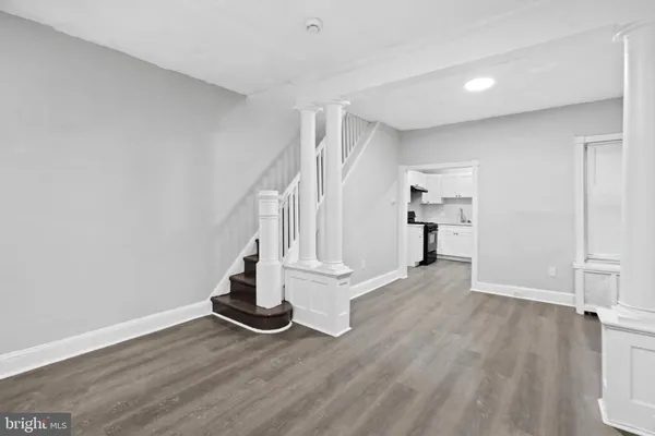 a view of entryway with wooden floor