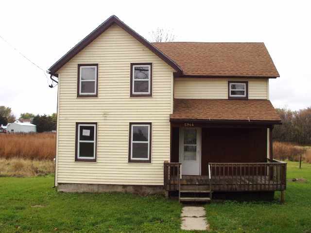 5944 South Clover Road Freeport, IL 61032 - Photo 1 of 1 a front view of a house with garden