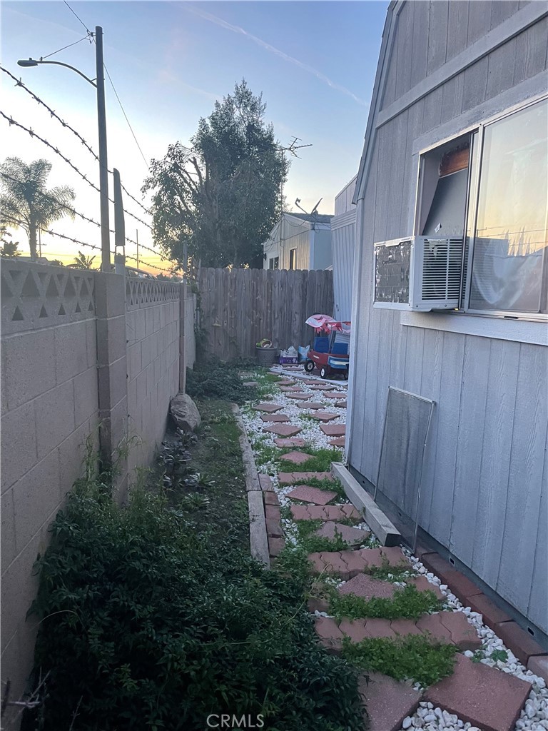 22600 Normandie Avenue, Unit 32 Torrance, CA 90502 - Photo 11 of 40 a backyard of a house with lots of green space