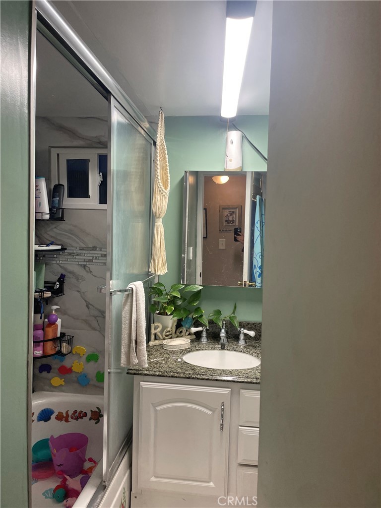 22600 Normandie Avenue, Unit 32 Torrance, CA 90502 - Photo 31 of 40 a bathroom with a sink and a mirror