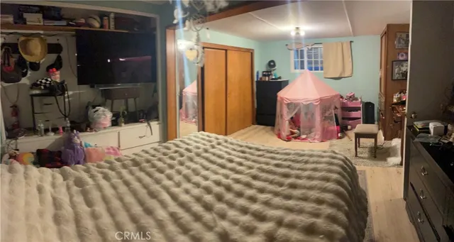 a kitchen with granite countertop cabinets stainless steel appliances and a window