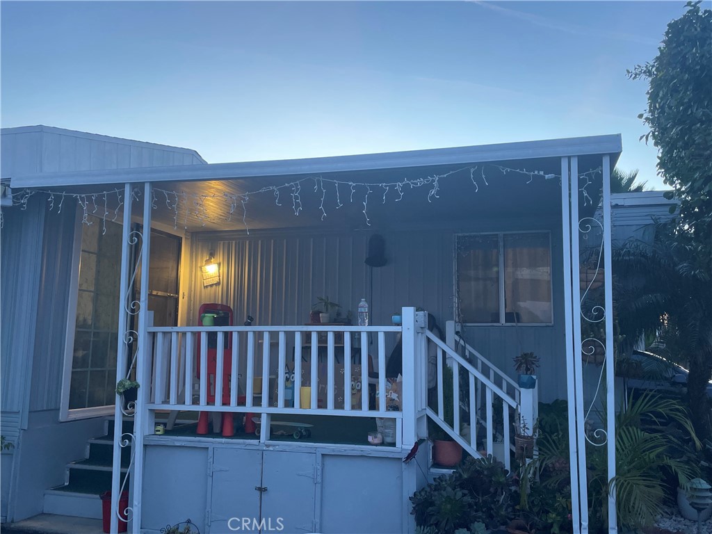 22600 Normandie Avenue, Unit 32 Torrance, CA 90502 - Photo 9 of 40 a view of a porch with wooden floor