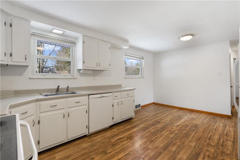 630 South Benbrook Road Butler, PA 16001 - Photo 5 of 18 a view of cabinets a wooden floor and a window