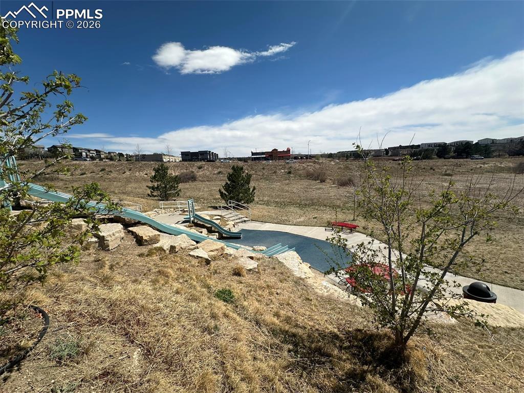 1238 Foothills Farm Way Colorado Springs, CO 80921 - Photo 46 of 50 a view of a lake with a mountain