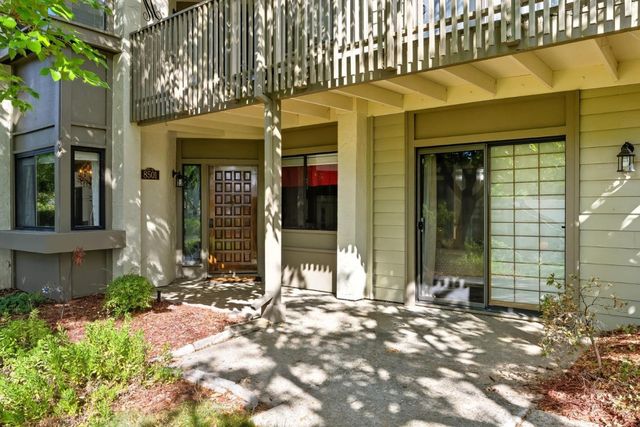 a view of a brick building with a large windows
