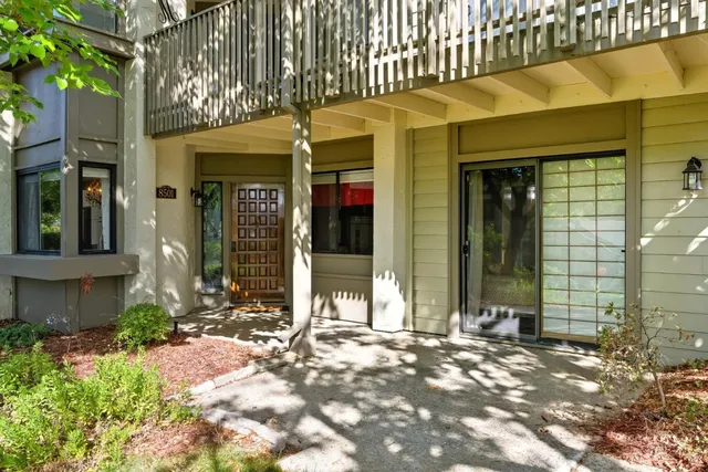 a view of a brick building with a large windows