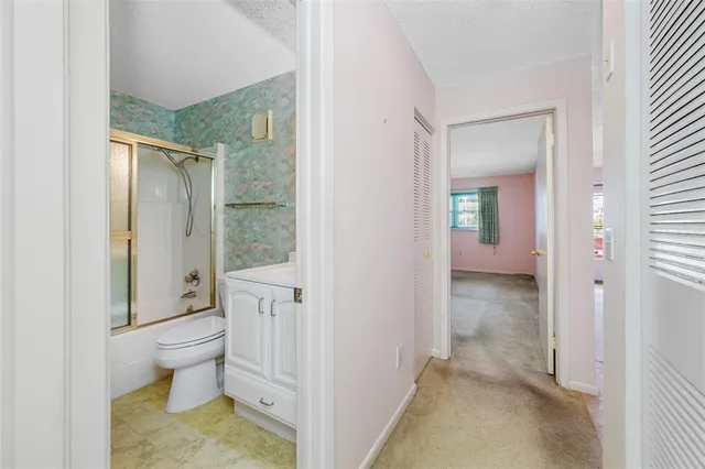 a bathroom with a sink and a toilet