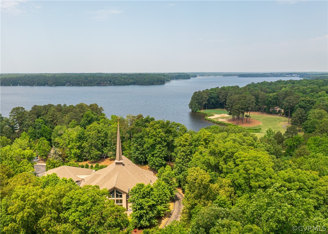3708 Commodore Point Circle Midlothian, VA 23112 - Photo 15 of 46 a view of a lake with houses in the back