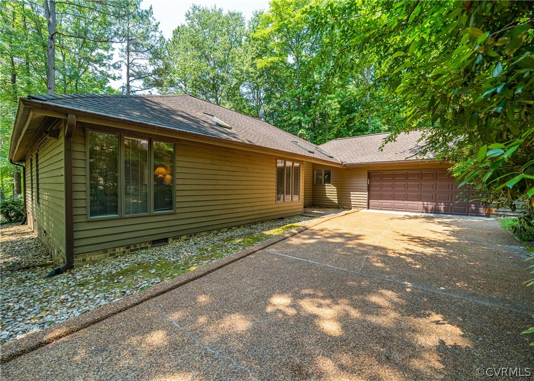3708 Commodore Point Circle Midlothian, VA 23112 - Photo 19 of 46 a front view of a house with a garden