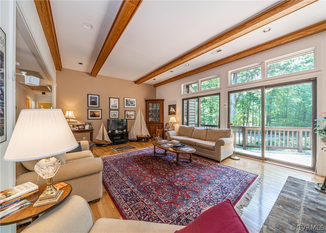 3708 Commodore Point Circle Midlothian, VA 23112 - Photo 27 of 46 a living room with furniture and a floor to ceiling window