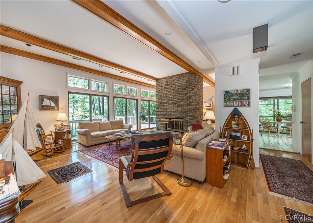 3708 Commodore Point Circle Midlothian, VA 23112 - Photo 28 of 46 a living room with furniture large wooden floor and a large window
