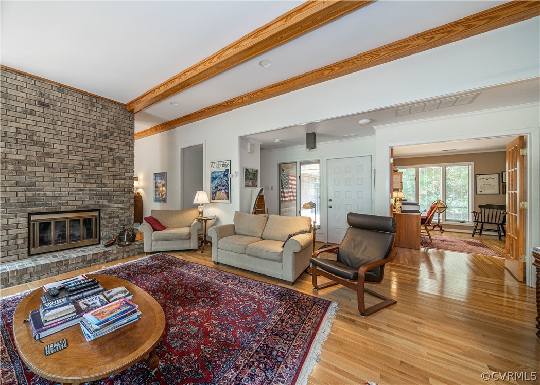 3708 Commodore Point Circle Midlothian, VA 23112 - Photo 29 of 46 a living room with furniture and a fireplace