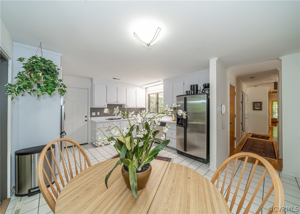 3708 Commodore Point Circle Midlothian, VA 23112 - Photo 38 of 46 a view of a dining room with furniture window and wooden floor