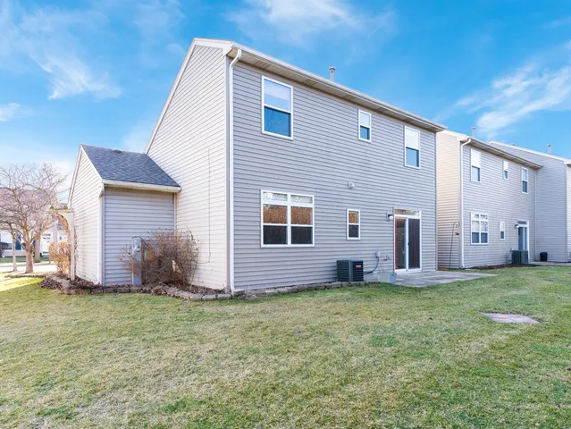 a front view of house with yard