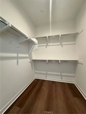 a view of an empty walk in closet