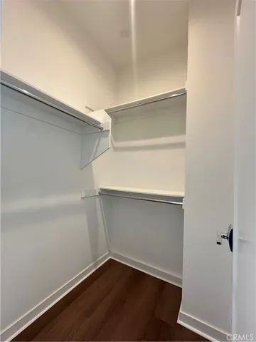 a view of an empty walk in closet