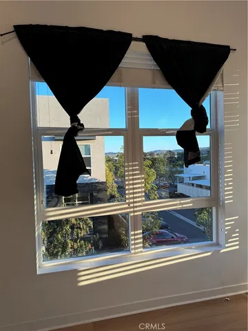 an outdoor view of a building from a window